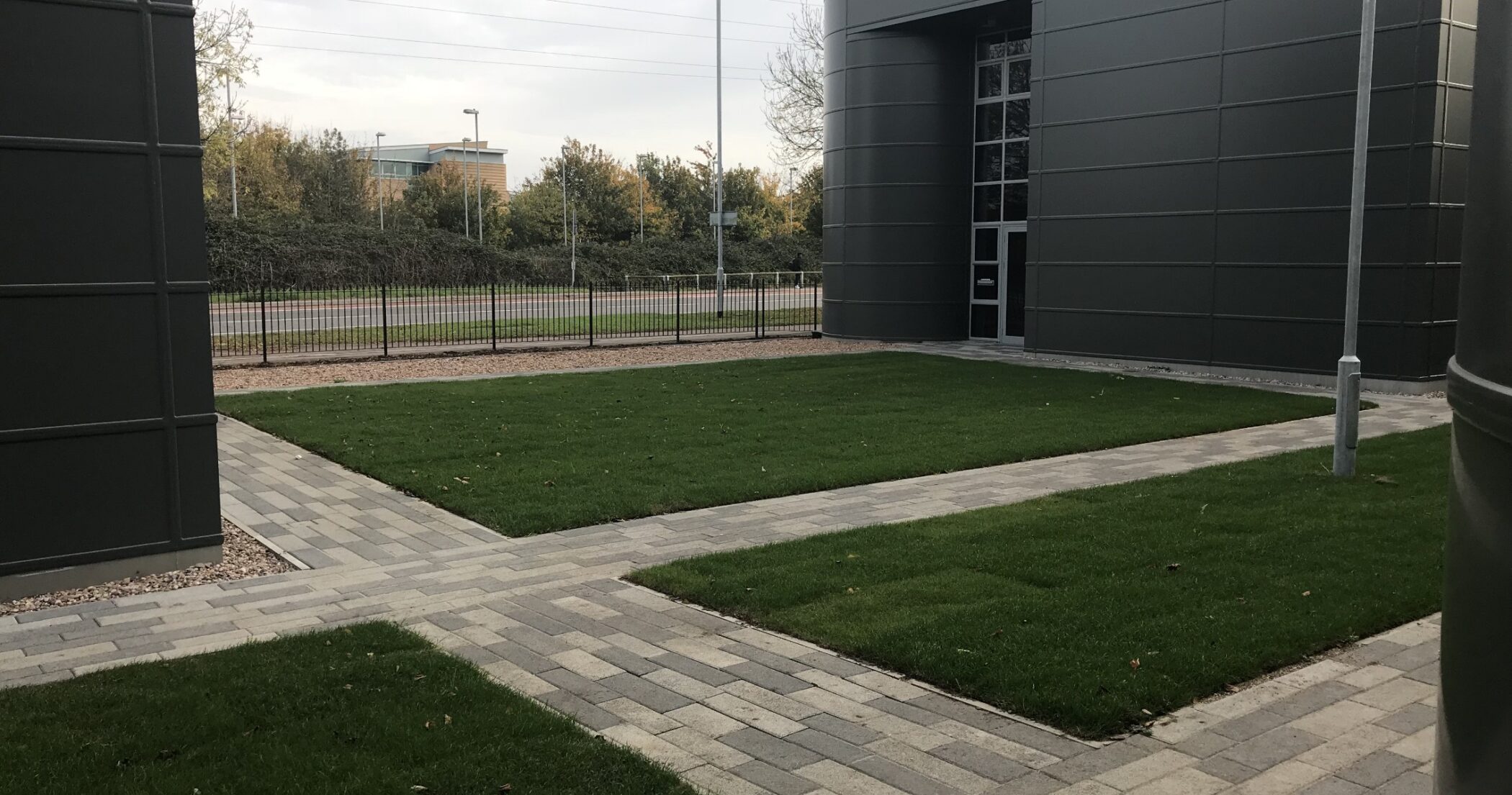 4front-construction-brook-mounts-court-exterior-new-grass